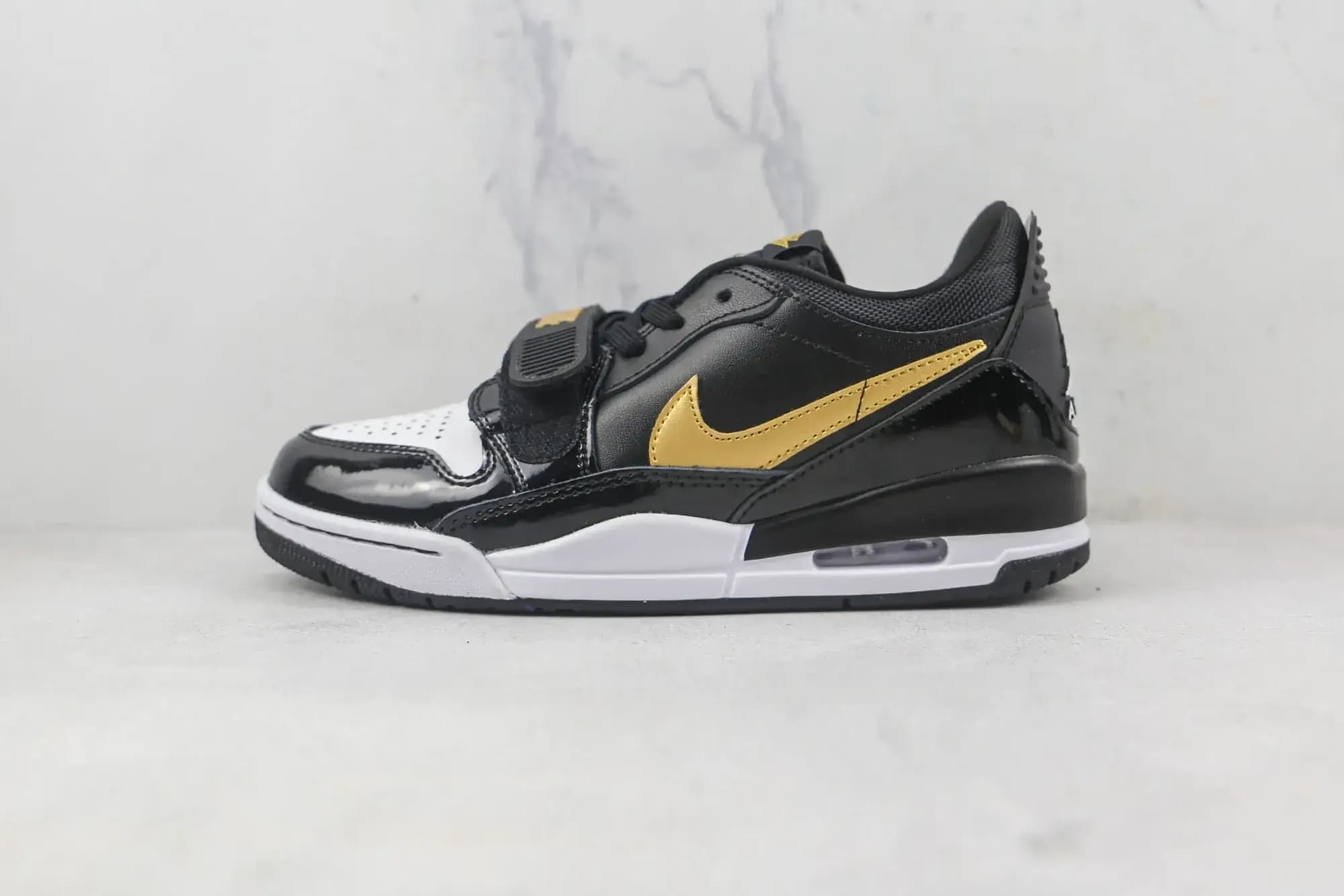 Jordan Legacy 312 Low — Black Metallic Gold
