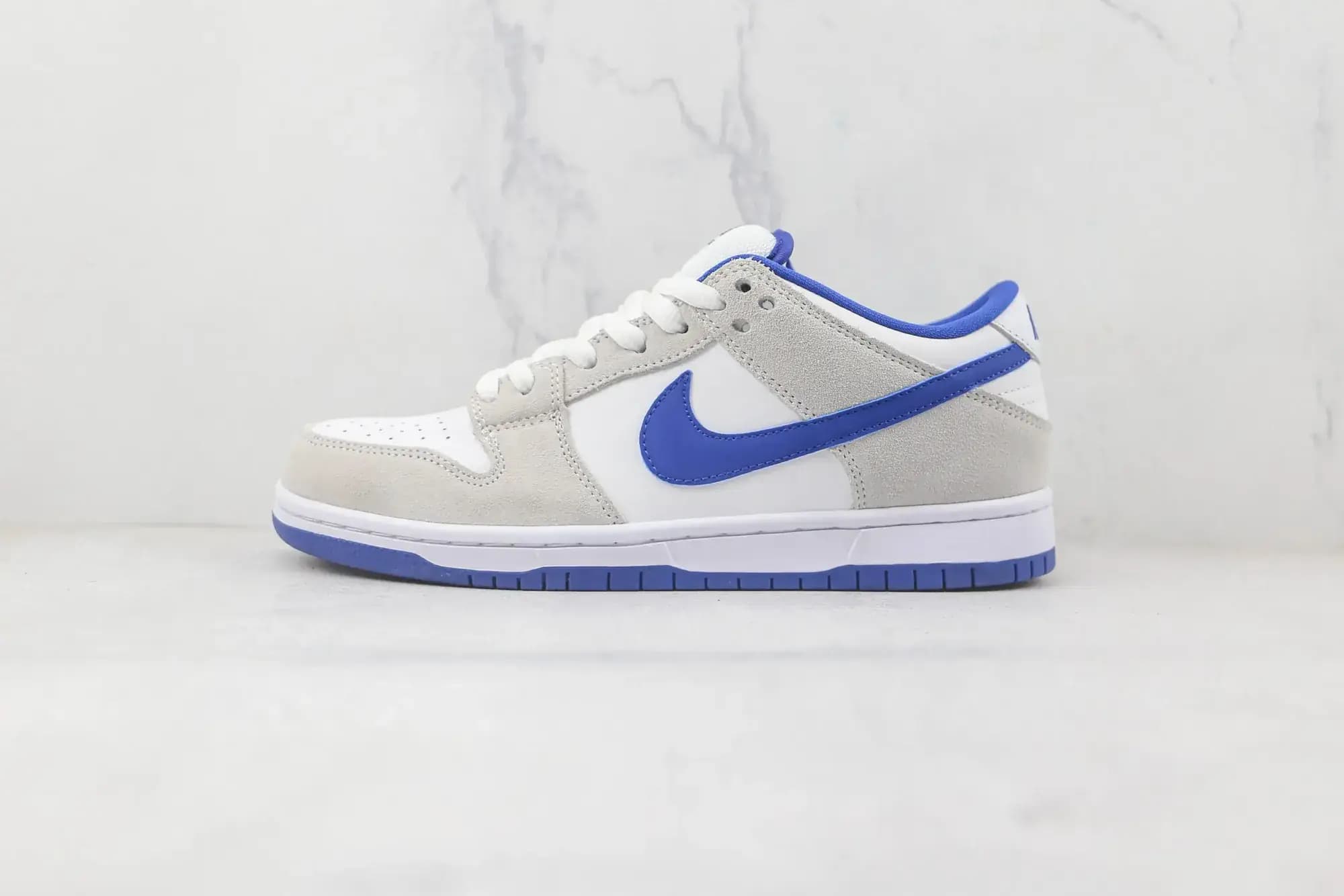 Nike SB Dunk Low — white grey blue tick