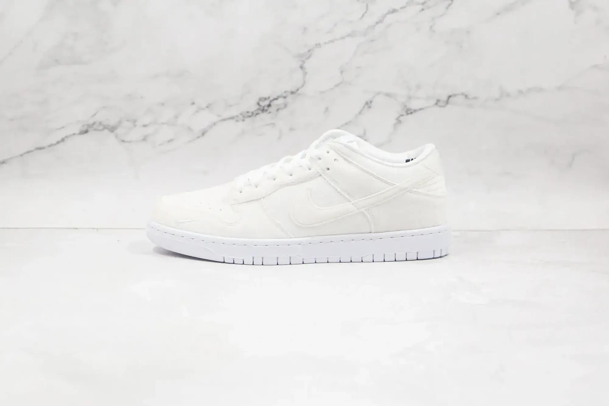 Nike DSM x Nike Dunk Low — White goose down