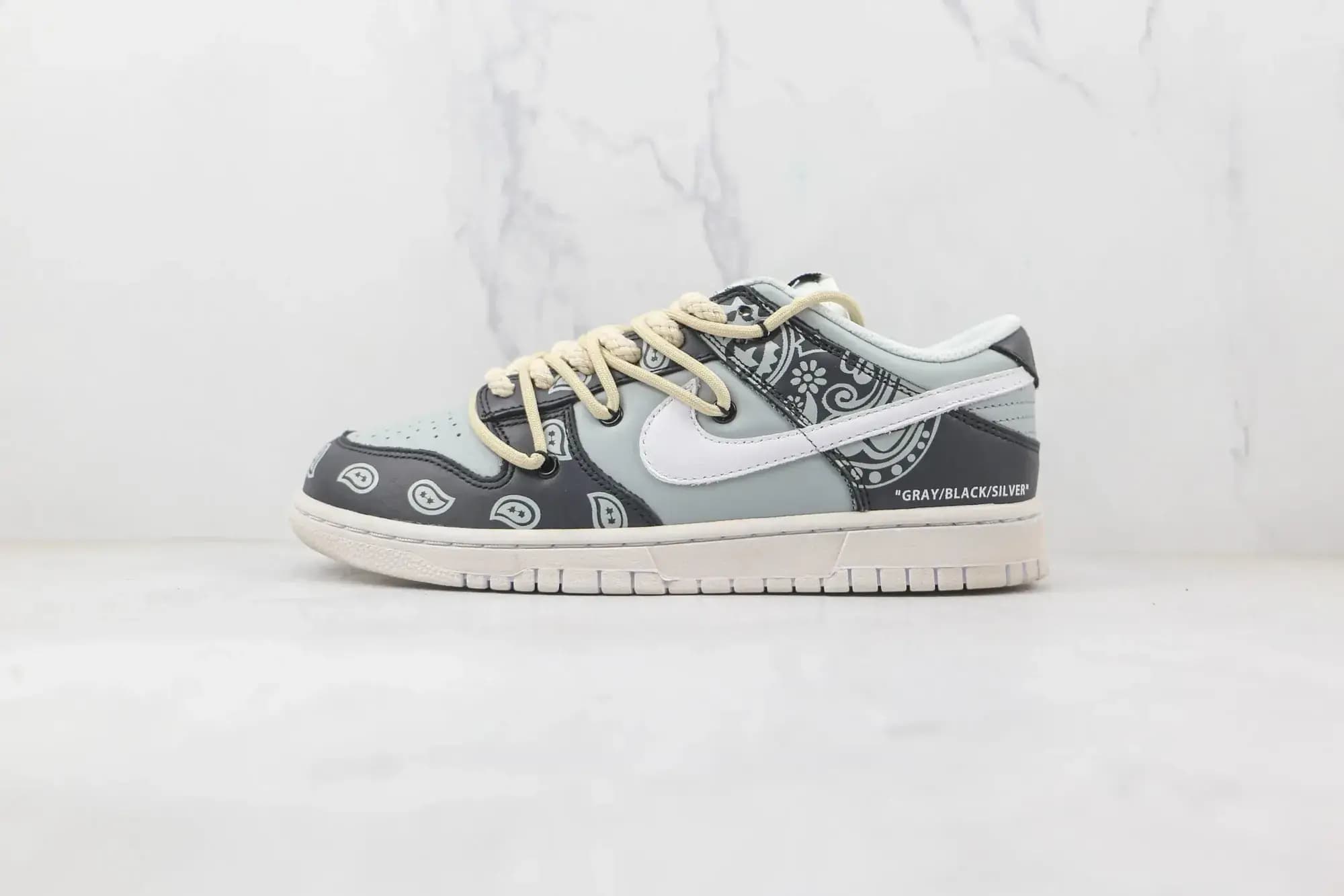 Nike SB Dunk Low Vintage cashew blossom — grey