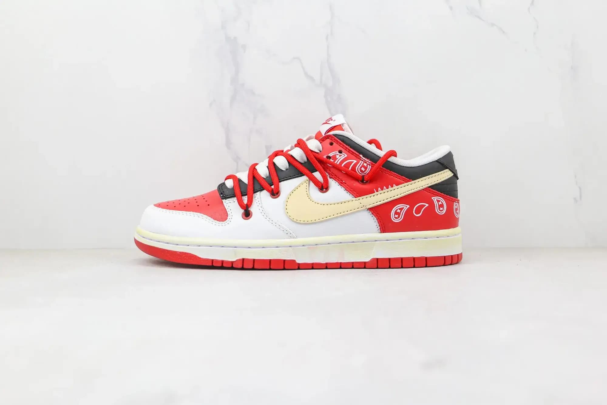 Nike SB Dunk Low Co branded — red and white deconstruction